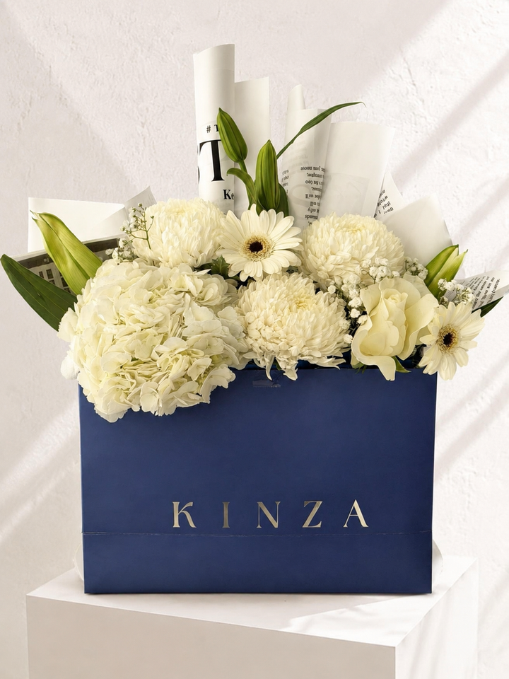 Signature Kinza Blue Bag Floral Arrangement - Ivory Serenity