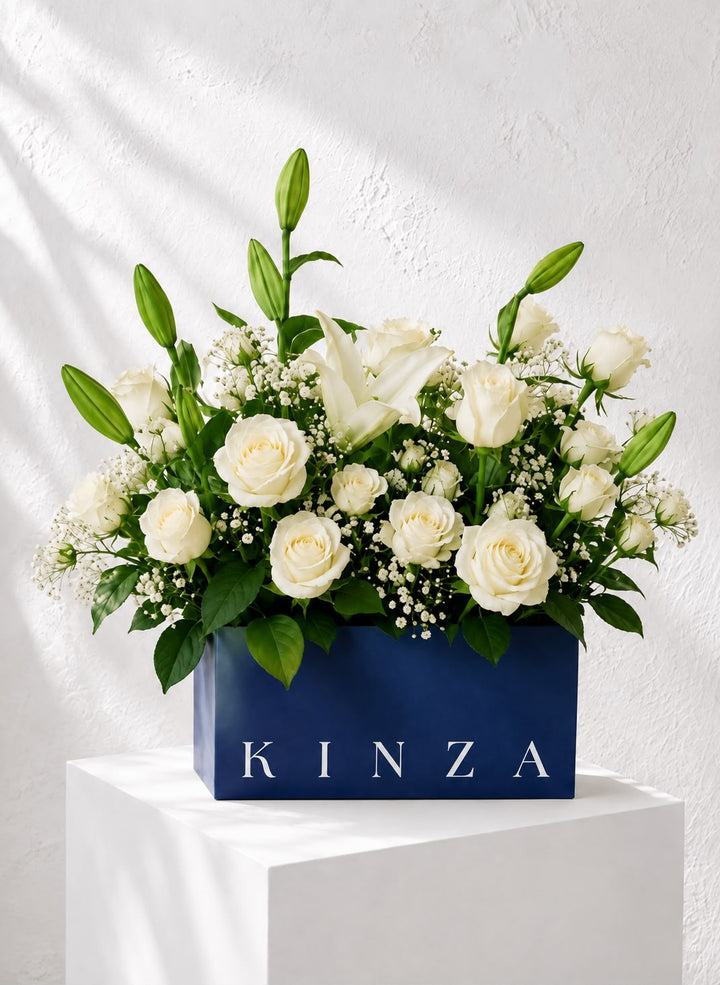 Signature Kinza Blue Bag Floral Arrangement