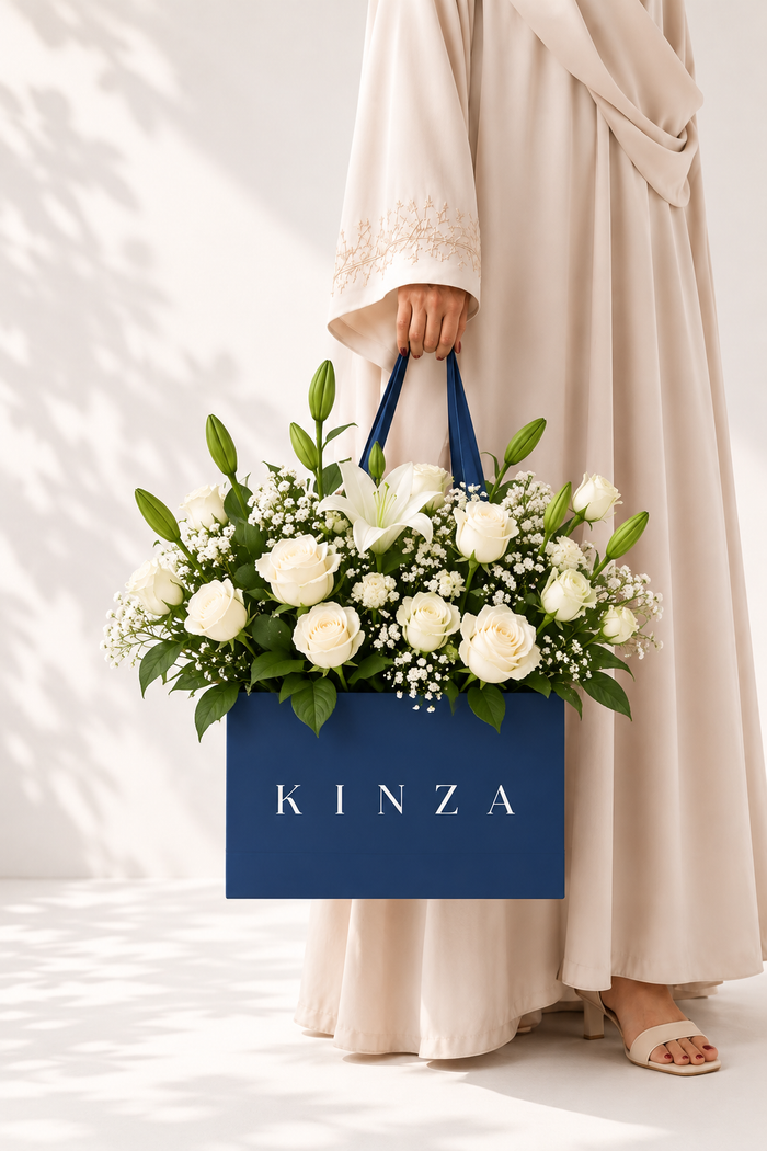 Kinza Blue Bag Floral Arrangement - Ivory Grace