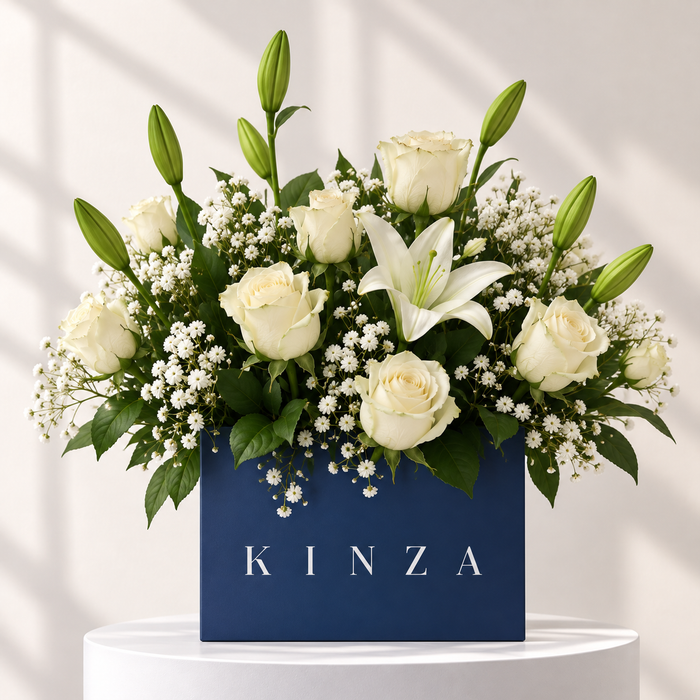 Kinza Blue Bag Floral Arrangement - Ivory Grace