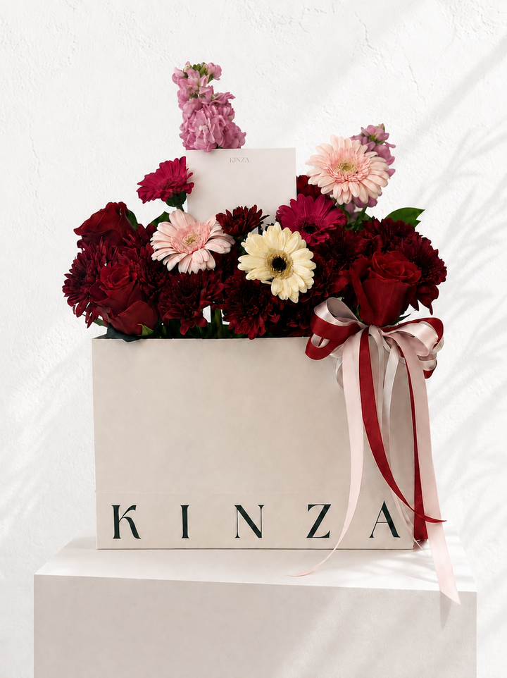 Signature Kinza White Bag Floral Arrangement - Crimson Garden